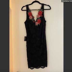 Bebe black lace dress - never worn with tags
